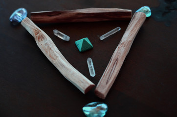 Tumbled healing crystals, shiny bright colors. Rainbow aura quartz, indigo aura quartz, champagne...