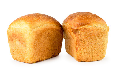 Two loaves of bread close-up on a white. Isolated.