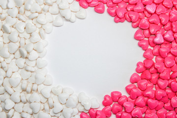 Valentines day background with hearts, colorful candies