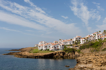 Fototapeta na wymiar Wonderful view with apartments at the sea on Menorca, Balearic Islands, Spain