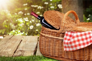 Picnic Basket with napkin om nature background