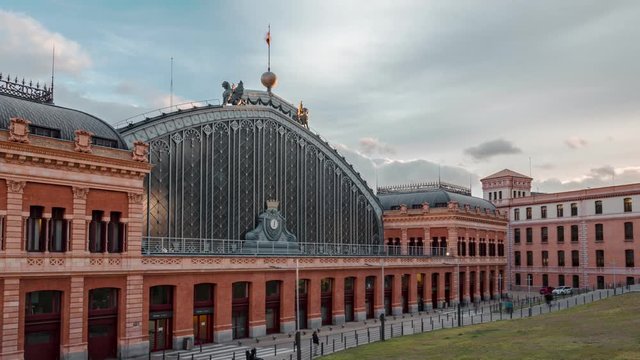 Madrid Puerta de Atocha Railway station in timelapse. Sunset time of day