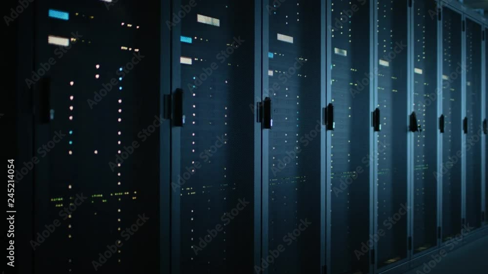 Fototapete Moving Data Shot of Dark Data Center With Multiple Rows of Fully Operational Server Racks. Modern Telecommunications, Cloud Computing, Artificial Intelligence, Database, Supercomputer