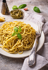 Italian spaghetti pasta with pesto sauce
