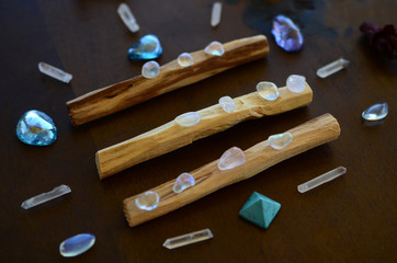 Tumbled healing crystals, shiny bright colors. Rainbow aura quartz, indigo aura quartz, champagne...