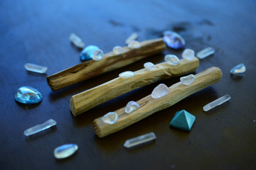 Tumbled healing crystals, shiny bright colors. Rainbow aura quartz, indigo aura quartz, champagne...