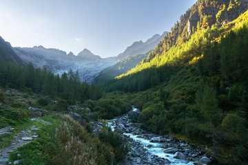 Fototapeta na wymiar Beautiful landscapes of the Alps with rivers and peaks.