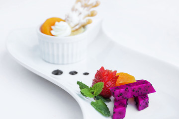 Beautiful elegant colorful dessert in a plate