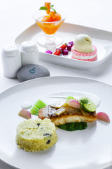 Main course and dessert of an elegant, creative restaurant meal - high end food concept