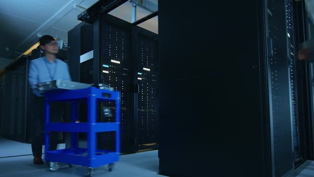 Time Lapse in Data Center: IT Specialists and Engineers Working, Running Maintenance Check, Diagnostics. Modern Concept of Telecommunications, Cloud Computing, Artificial Intelligence, Database