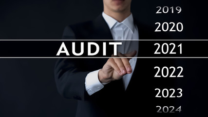 Audit report 2021, businessman finds data in virtual archive financial statement