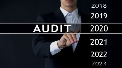 Audit report 2020, businessman finds data in virtual archive financial statement