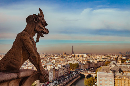 Chimera of Notre Dame de Paris over the city