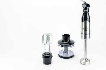 Blender with accessory on the white matt background with copy space