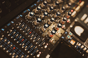 Obraz na płótnie Canvas Music Recording Studio Mixing console close up dials and knbos