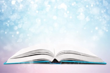 Opened book on white background.Opened book on white background.