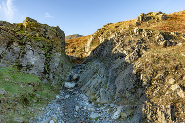 Mountain rocky path with a majestic blue sky