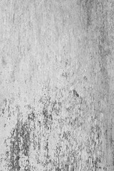 High resolution full frame background of a weathered, faded and dirty gray plywood or hardwood texture in black and white.