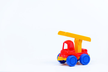 Toy plastic car on a white background