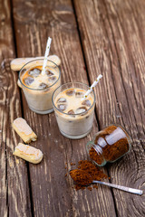 Iced iced coffee on a wooden table. Summer drinks.