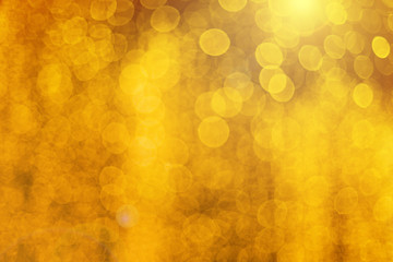 Golden light bokeh for abstract background.