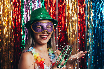 Masquerade woman celebrating the Brazilian carnival party