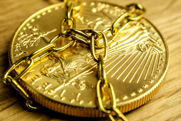 spot price of gold is held tight in chains manipulated