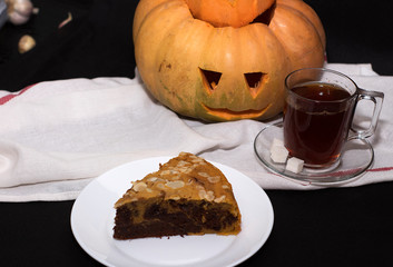 chocolate pumpkin marble cake with almond flakes