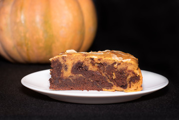 chocolate pumpkin marble cake with almond flakes