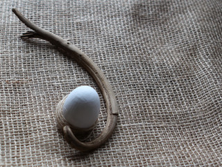 Easter egg on burlap background