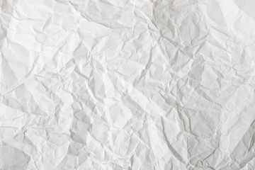 Fototapeta premium White crumpled paper background and texture. Wrinkled creased paper white abstract.
