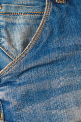 Fototapeta premium Pocket on jeans fashion background. Details from jeans pocket.