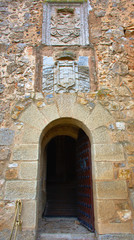 Fototapeta na wymiar CONSUEGRA, SPAIN - NOVEMBER 22, 2018: Route of Don Quixote, interior entrance of the medieval castle of the city of Castilla La Mancha.