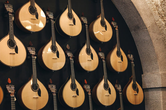 Rows of Portuguese guitars on the wall