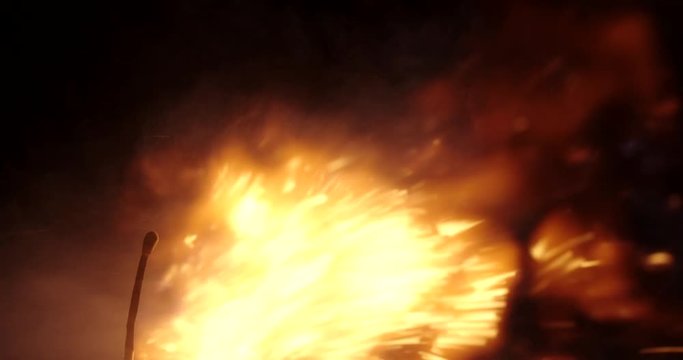 Wooden match burning in slow motion becomes a blow torch when sprayed with an aerosol spray