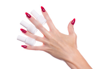 Bright festive red manicure on female hands. Nails design