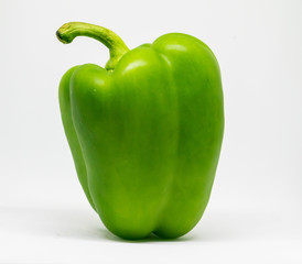 Closeup of a green pepper isolated on a white background