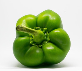 Closeup of a top of a green pepper, isolated on a white background