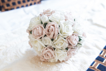 Bridal flowers bouquet with roses and ribbon