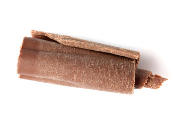 Curl of tasty chocolate on white background