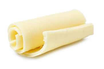 Yummy chocolate curl for decor on white background