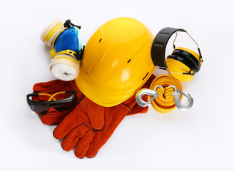 Protective workwear on white background, top view. Safety equipment