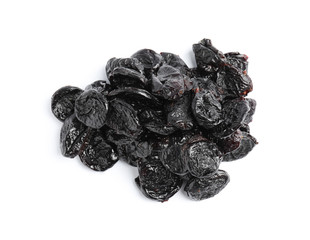 Heap of tasty prunes on white background. Dried fruit as healthy snack