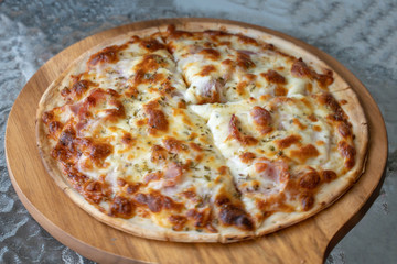 Hot homemade barbecue chicken pizza with onions and cheese.