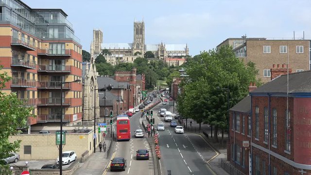 Traffic and cathedral, Lincoln, England