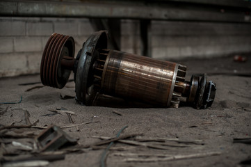 Industrial electric motor core abandoned in a factory building