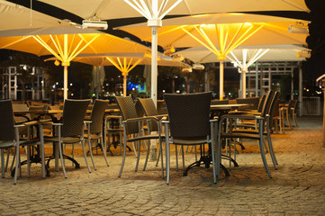 Outdoor cafe at night