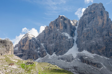 Pillar of the Crozzon di Brenta with the Cima Tosa peak and the Canalone Neri seen from the path leading to the Rifugio Brentei (below), Dolomiti di Brenta, in Trentino Alto Adige, Italy. 2016. 