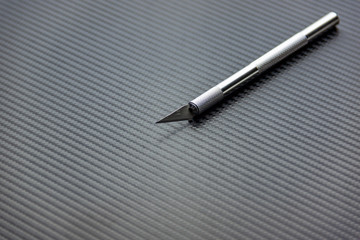 Surgical stainless steel metal scalpel isolated on Carbon 2