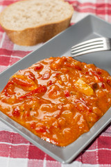 Domestic vegetable stew served on the plate with bread